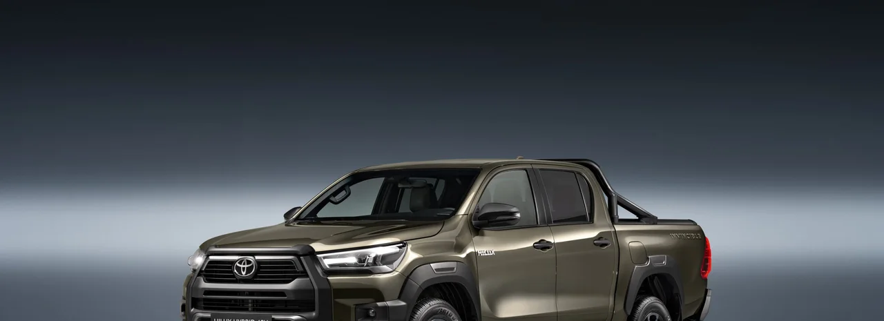 Bronze current-generation Toyota Hilux Double Cab front three-quarter view